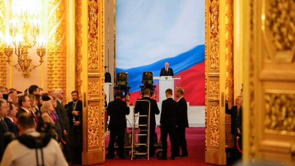 The Russian flag prominently displayed at Putin's inauguration, symbolizing unity and patriotism during the oath ceremony.